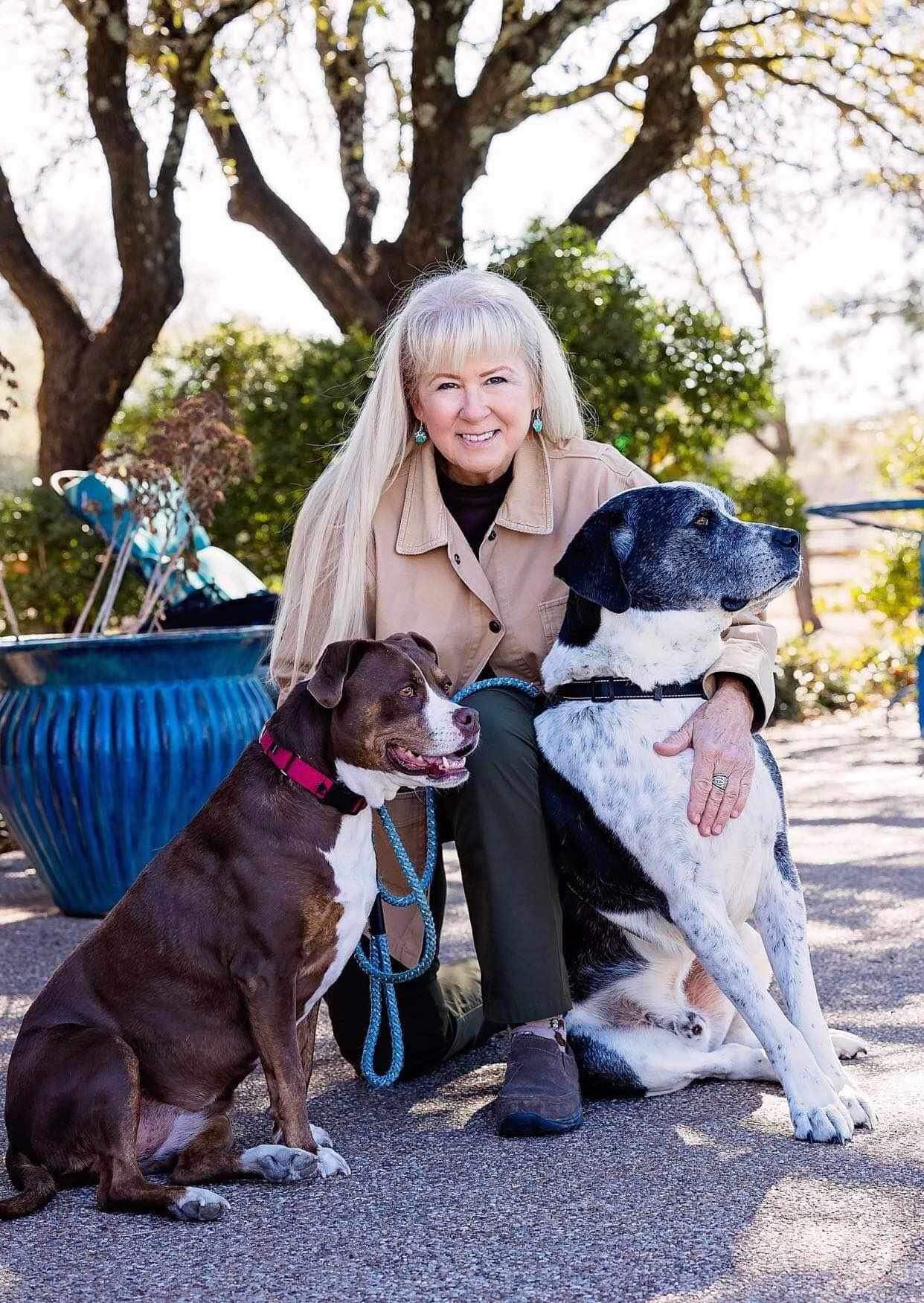 Woman with two dogs.